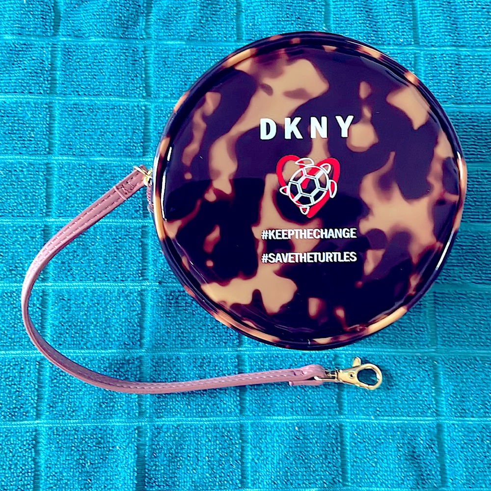 DKNY wristlet, save the turtles. In Excellent Condition.